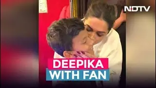 Deepika Padukone Kisses Little Fan At 'The Last Film Show' Screening
