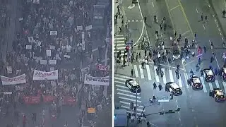 Tensions rise after day of protests in downtown LA against recent ICE shootings