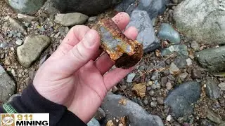 Gossanous Rock In A Creek With Magnetic Black Sands!