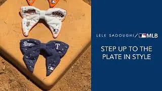 Bases are loaded. ⚾✨ Rep your team for the playoffs with MLB x Lele Sadoughi accessories.
