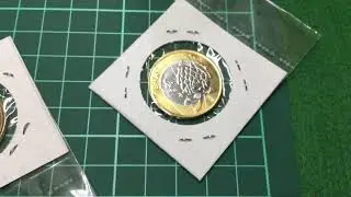 Moedas ol&iacute;mpicas do mascote Vin&iacute;cios e do mascote Tom