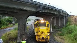 Trains in the rain at Oaro - by drone