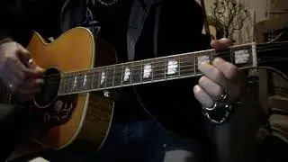 Mick Jagger Party doll on acoustic guitar