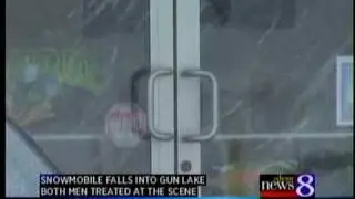 Snowmobilers fall through Gun Lake ice