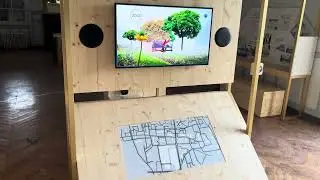 Diffusion vid&eacute;o synchronis&eacute;e avec r&eacute;tro-&eacute;clairage d'une maquette.