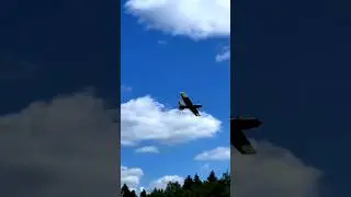 A dead loop of a 3D-printed RC plane in the clear sky.