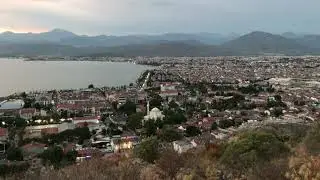 Muezzin prayer calls on hill overlooking Fethiye, Turkey