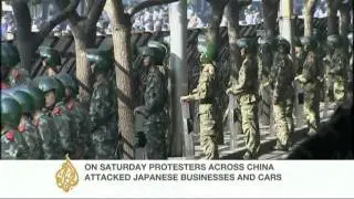 Chinese navy holds drills as protests against Japan ramps up