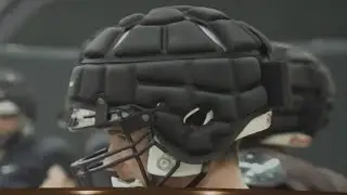 High school football teams using specialized caps to avoid concussions