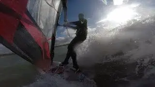 Riding a wave at Pointe aux Oies