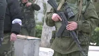 Russian forces take over Crimean military bases