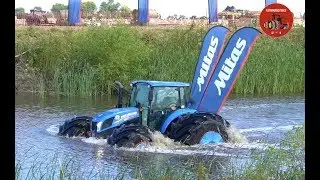 New Holland Tractor Floating across Water