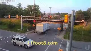 Red light runner crashes Big  truck into the 11foot8 bridge