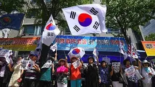 Supporters react after Samsung chief Lee Jae-yong jailed