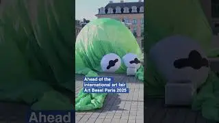 Giant Kermit the Frog balloon takes over central Paris square