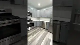 This grey kitchen is a minimalist's dream, a neutral color scheme that's both calming and chic!