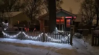 Christmas Lights on House with the Snow n Buddy outside for a walk.