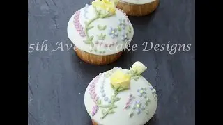 Royal Icing Roses and Blossoms Piped on a Cupcake