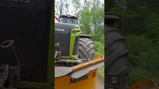 Chipper with Claas tractor on a rainy day