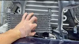 Installing a transmission cooler… Learn how you can do the same in your garage…