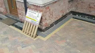 paving in autumn with charcoal borders & buff pin strip/ Nottingham