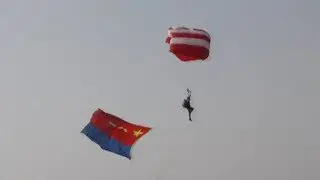 PLA Air Force conducts parachute training exercise