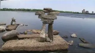 Inukshuk Balanced Natural Rock Sculptures at Remic Rapids Ottawa