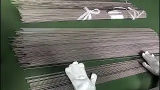 titanium bars inspecting one by one