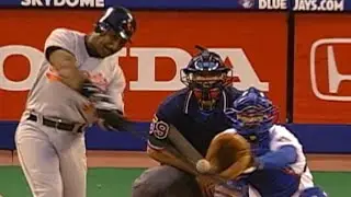 Baines crushes a solo blast off Halladay