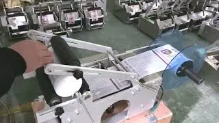 Semi automatic tabletop type round bottle labeler testing video