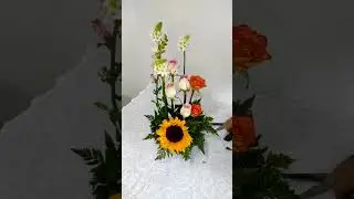 Cute natural flower and sunflowers centerpiece