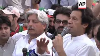 Khan at protest against reopening of NATO supply routes
