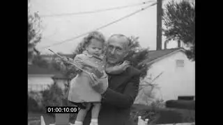 Harry Warner and Baby (Unknown Date)