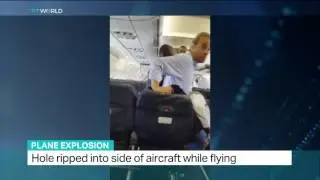 Footage shows Somali plane after explosion ripped hole into the side of aircraft while it was flying