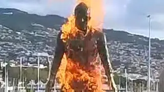 Bizarre moment vandal sets Cristiano Ronaldo statue on FIRE before dancing around flames and sharing