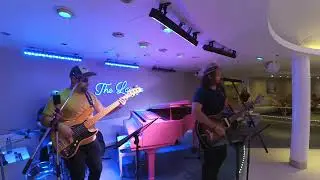 Leo Mahuad (vocals, guitar), Andrei Lebedev (bass, backing vocals), Andy Bennison (drums).