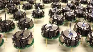 Self-assembly of thousand little robots 