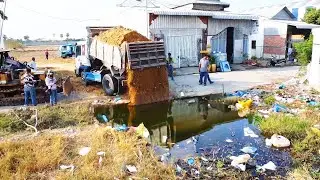 Amazing work Mitsubishi bulldozer and Damp truck start to delete garbage site flood pond and forest