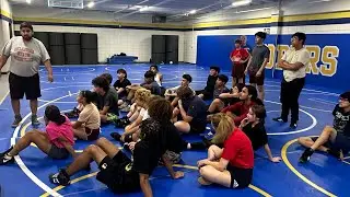 Coach Roberts teaches about the Violent Dance