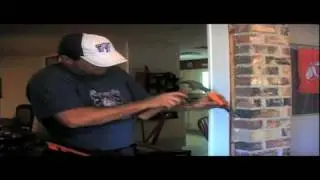 Installer Replacing a Metal Window In A Brick Wall