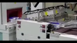 Emballeuse film r&eacute;tractable - Shrink film packaging Allard Graphic