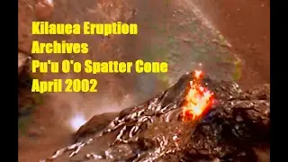 Kilauea's Pu'u O'o Eruption- Spatter cone erupting lava. April 2002.