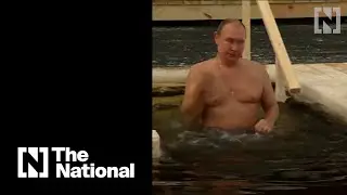 Russia's Putin takes traditional Epiphany dip in icy waters