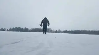 Ice Eater, having a beer while ice fishing.