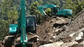 JCB Backhoe, Excavator and JCB working for hilly Road Construction