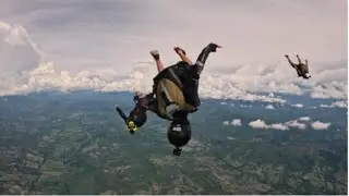 Parachutists falling in free fall | STOCK FOOTAGE
