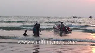 Boat ride on Murudeshwar Beach in Karnataka