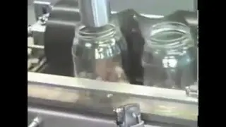 Machine of Dosing Mushrooms in Jar. www.storm-engineering.bg