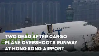 2 killed after cargo plane slides off runway in Hong Kong