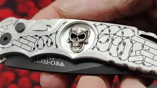 PROTECH TR-5.62 SILVER HANDLE. CUSTOM SHAW STERLING SKULL. BLACK FINISHED BLADE. LTD EDITION OF 300